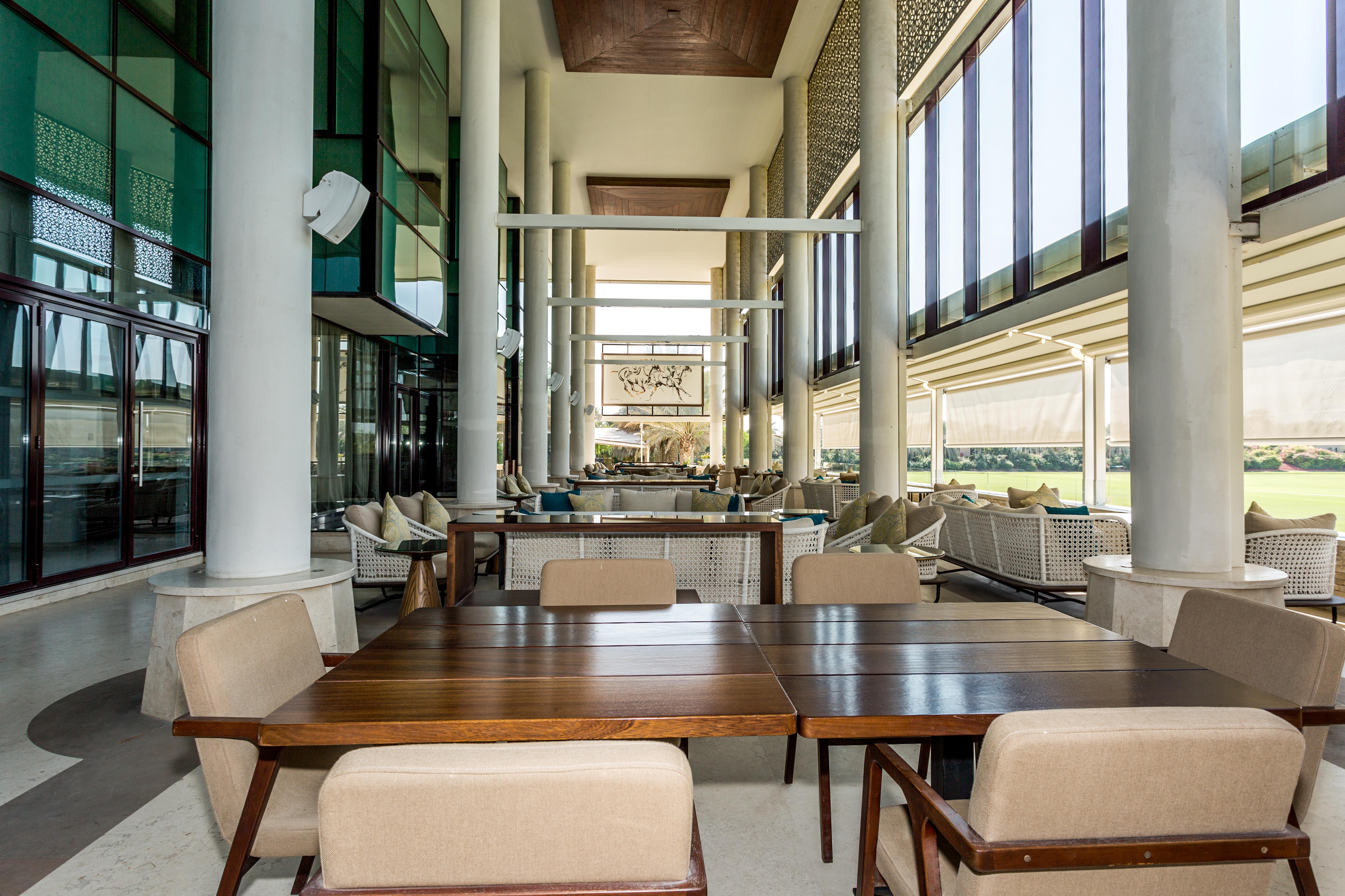 דובאי Melia Desert Palm Member Of Melia Collection מראה חיצוני תמונה The interior of the clubhouse at the Abu Dhabi Golf Course
